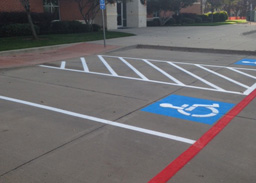 striped parking lot spaces